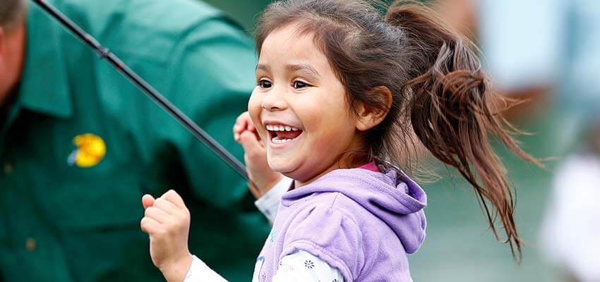 Child excited about catching a fish