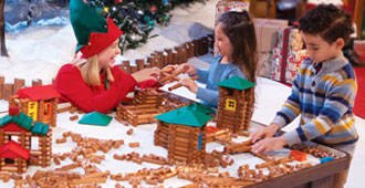 kids playing with lincoln logs