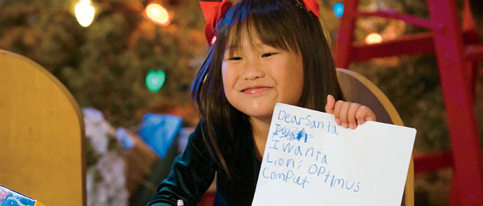 Child writing letter to Santa
